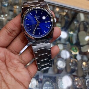 Tissot ( silver chain with blue dial)